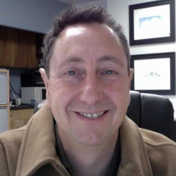 Photo of a satisfied client explaining how the process reduced stress